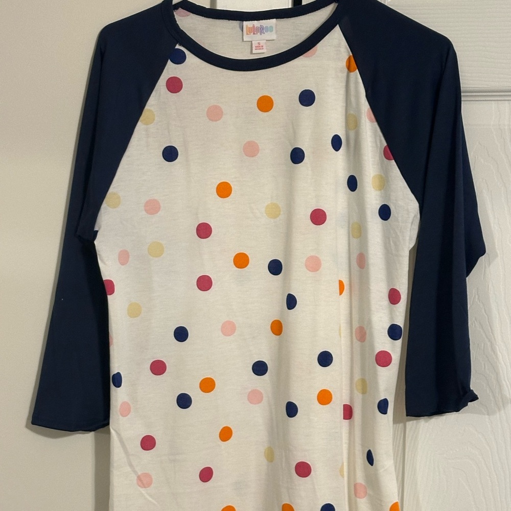 Lularoe Randy baseball t shirt. Polka dot body, Navy sleeves. NWOT. Small.
